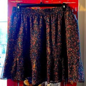 Cute skirt never worn. Light and a little shimmer. Paisley print